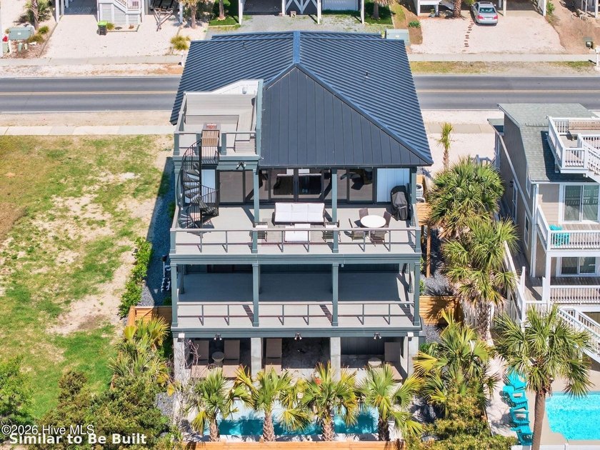 Experience elevated coastal living at 310 E Second Street, an - photo 2
