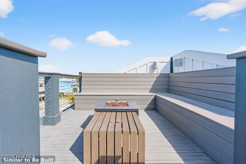 Experience elevated coastal living at 310 E Second Street, an - photo 3