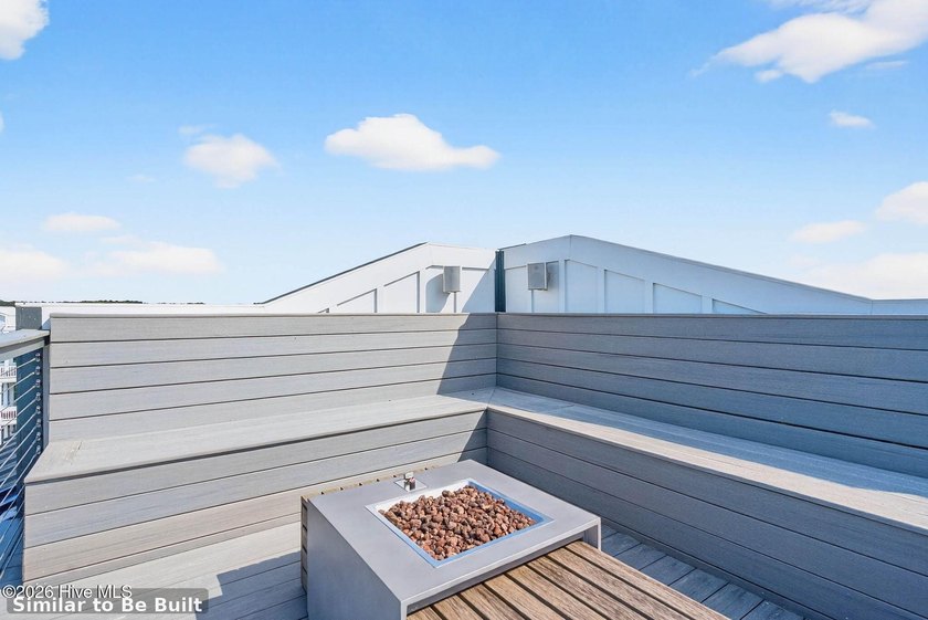 Experience elevated coastal living at 310 E Second Street, an - photo 4