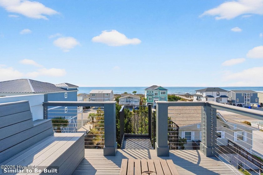 Experience elevated coastal living at 310 E Second Street, an - photo 5
