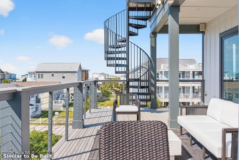 Experience elevated coastal living at 310 E Second Street, an - photo 7