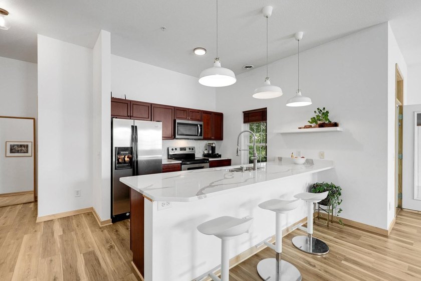 Welcome home to Unit 101 at Greenway Terrace Condominiums, where - photo 14