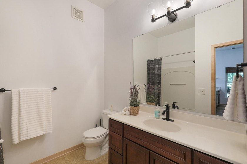 Welcome home to Unit 101 at Greenway Terrace Condominiums, where - photo 15