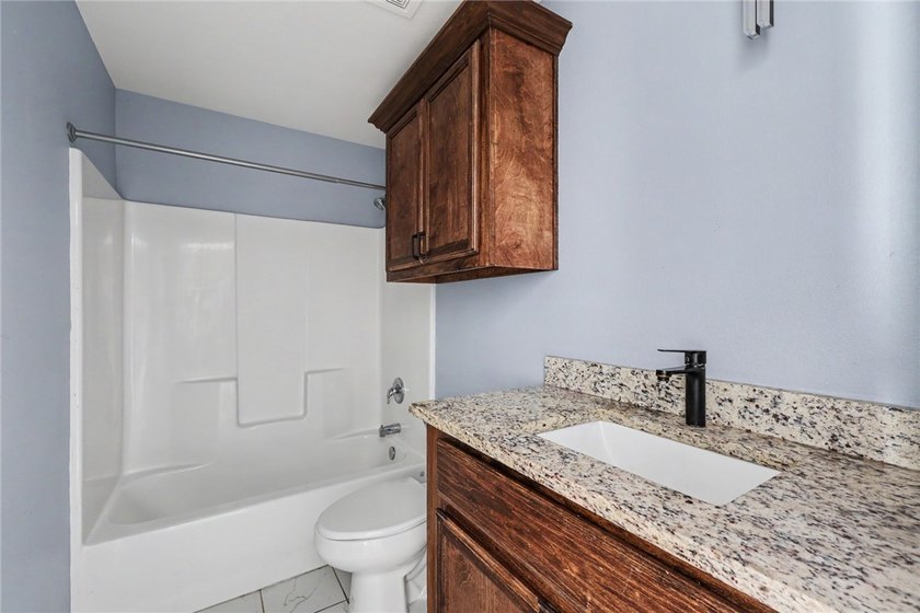 Looking for a move-in ready home with modern updates and - photo 11
