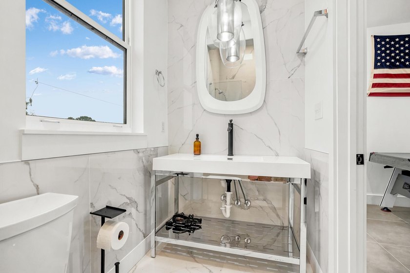 Offered fully furnished, 212 George C. Wallace Boulevard is a - photo 43