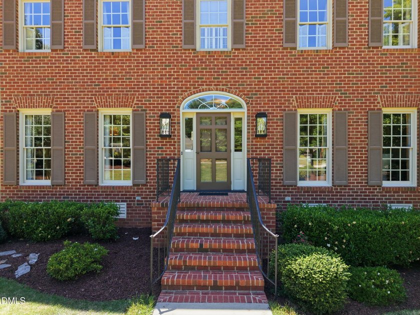 Set on a beautifully landscaped and private 0.51-acre homesite - photo 3