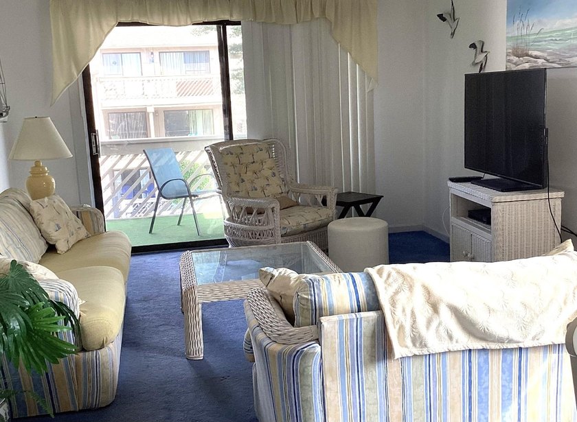 Welcome to this bright and inviting 2-bedroom, 2-bath condo - photo 11