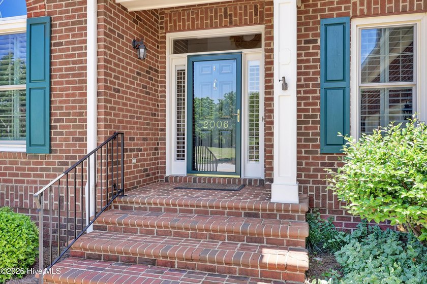Nestled on a peaceful pond in the gated community of Landfall - photo 7