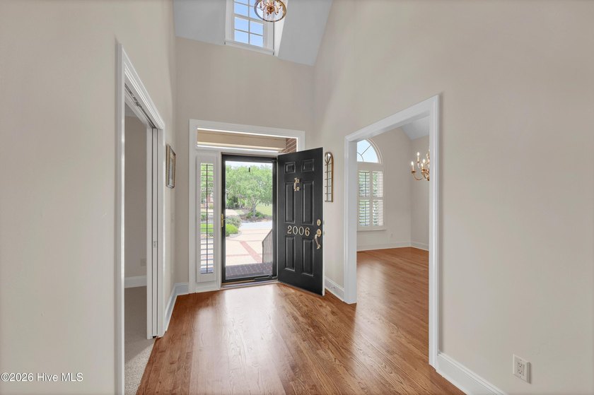 Nestled on a peaceful pond in the gated community of Landfall - photo 8