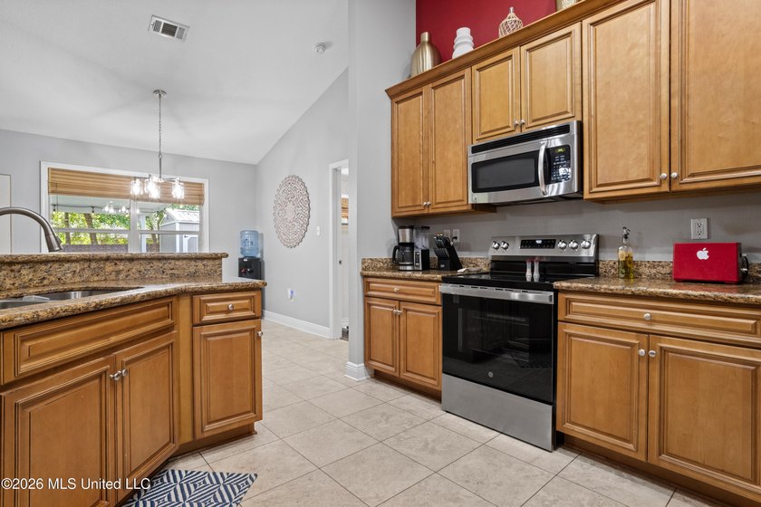 Welcome to this ALL BRICK, 4 bedroom, 2 bath beauty in the - photo 12