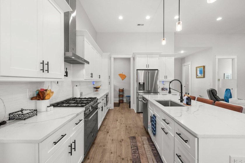 Welcome to 1312 Whooping Crane Drive! Designed for elevated - photo 16
