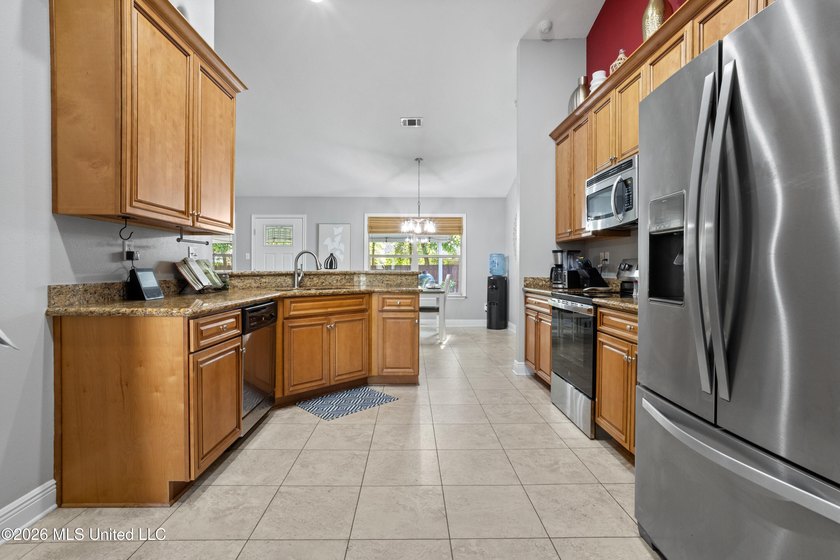 Welcome to this ALL BRICK, 4 bedroom, 2 bath beauty in the - photo 16