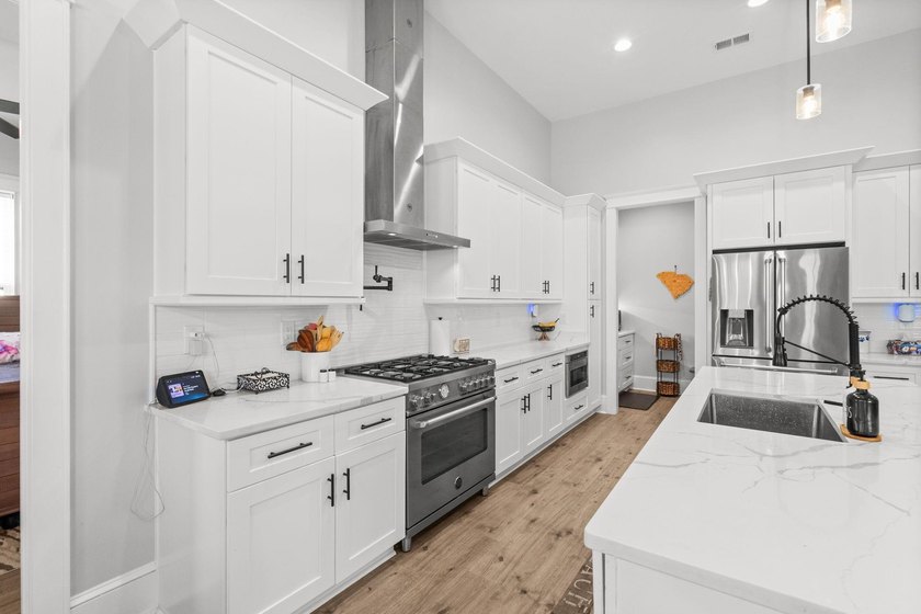 Welcome to 1312 Whooping Crane Drive! Designed for elevated - photo 17
