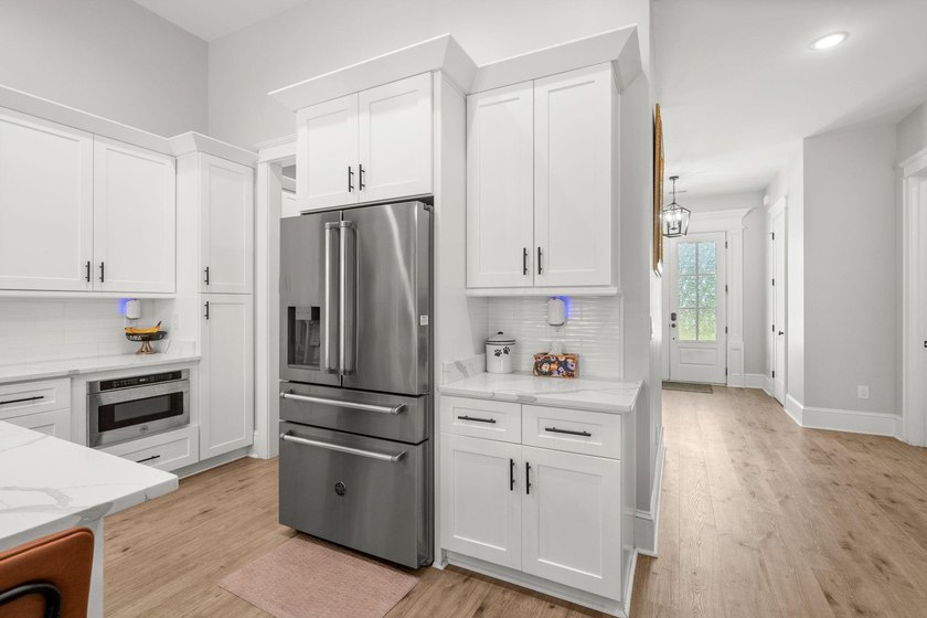 Welcome to 1312 Whooping Crane Drive! Designed for elevated - photo 18