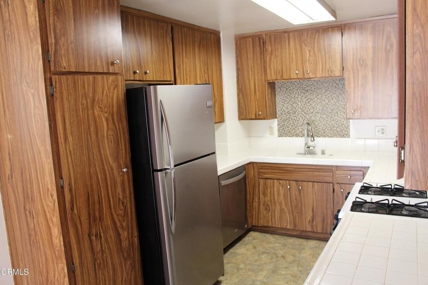Welcome to this second-level Parkside condominium, offering the - photo 14