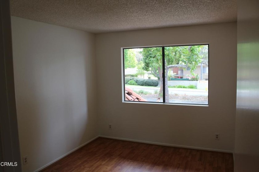 Welcome to this second-level Parkside condominium, offering the - photo 18