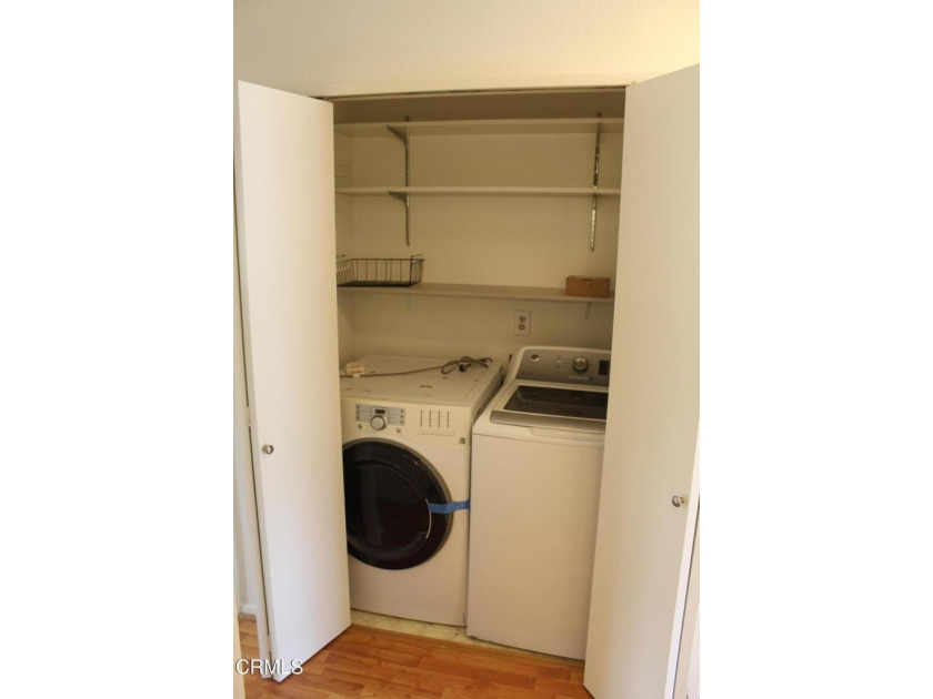 Welcome to this second-level Parkside condominium, offering the - photo 24