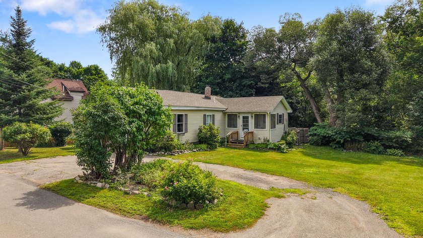 Welcome to this well-maintained home tucked into an established - photo 3