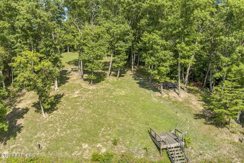 Experience the ultimate lakeside lifestyle on this stunning - photo 16