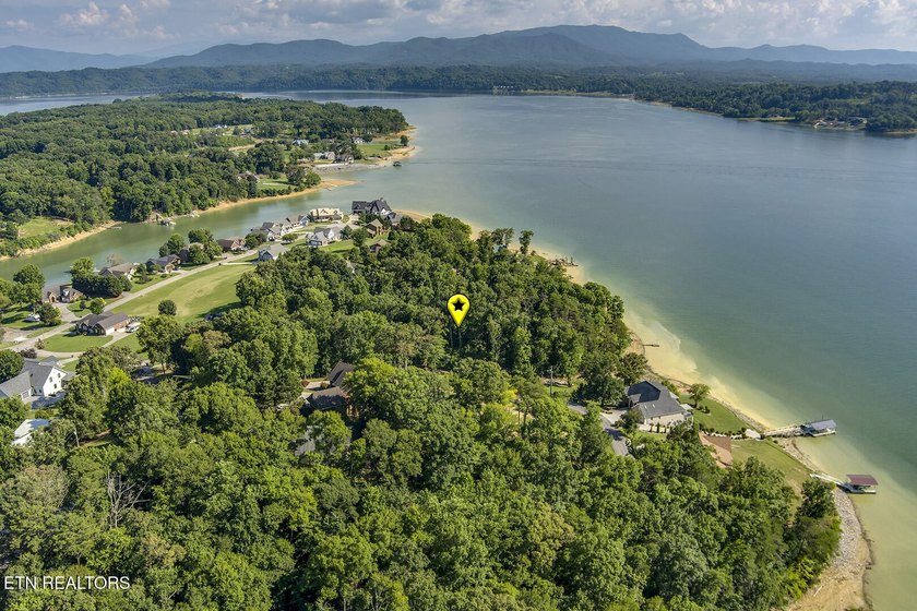 Experience the ultimate lakeside lifestyle on this stunning - photo 21