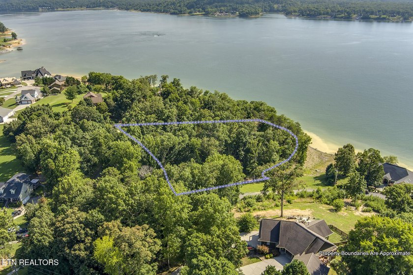 Experience the ultimate lakeside lifestyle on this stunning - photo 25