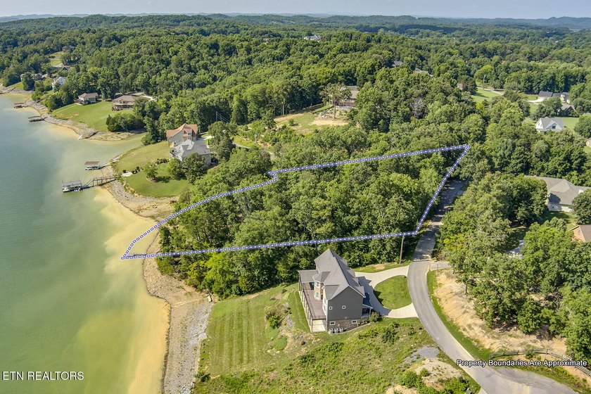 Experience the ultimate lakeside lifestyle on this stunning - photo 29