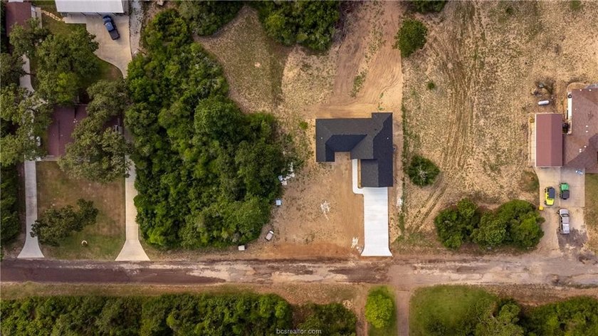 New construction on over half an acre in Hilltop Lakes. Situated - photo 22