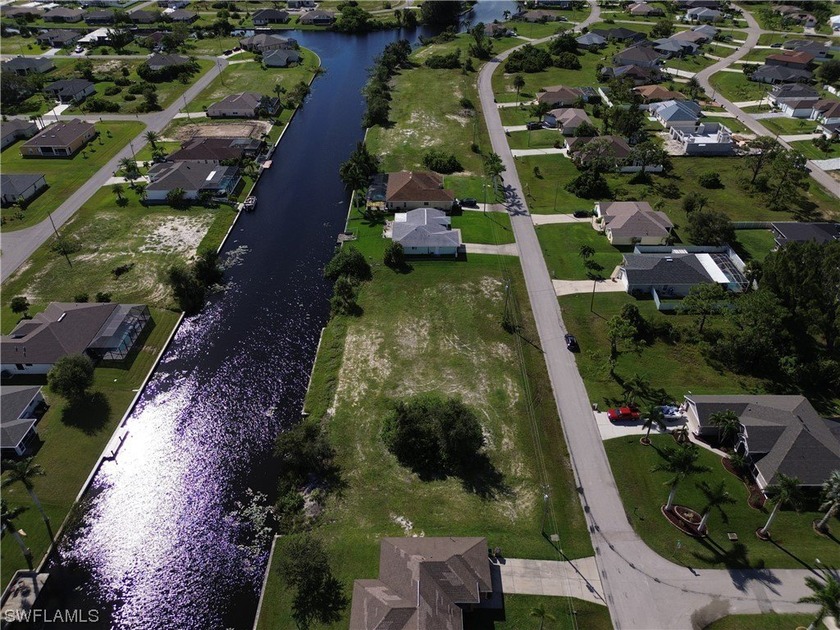 Nice southern exposure lot + Seawall on a fresh water canal - photo 8