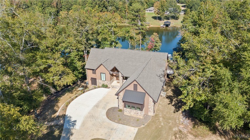 This stunning 4-year-old custom home on Lake Tuscaloosa offers - photo 2