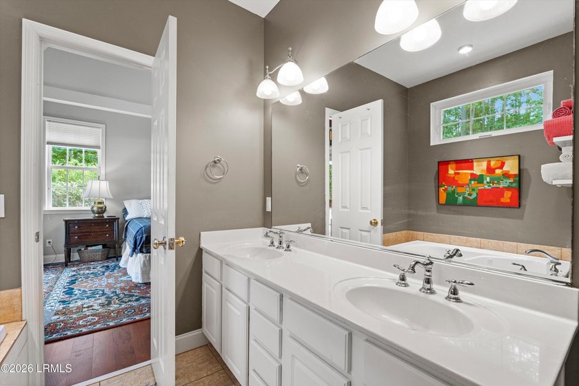Nestled in the highly desirable Royal Pines community of - photo 17