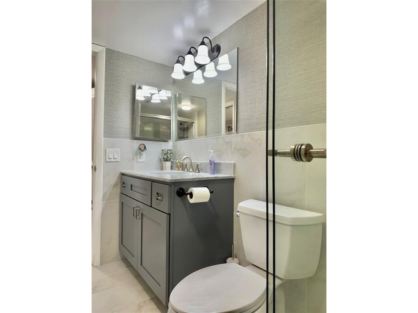 Discover this delightful first-floor unit in the sought-after - photo 18