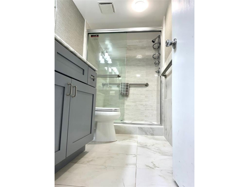 Discover this delightful first-floor unit in the sought-after - photo 19