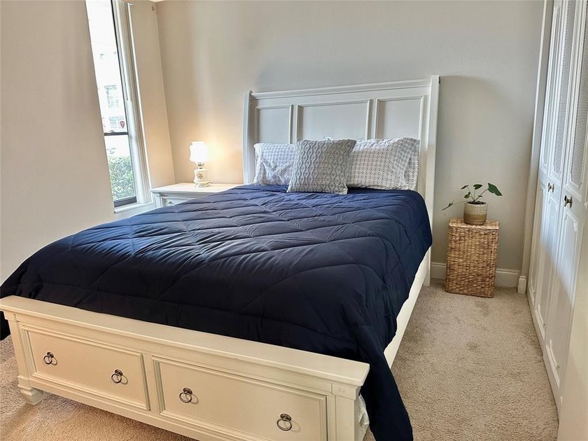 Discover this delightful first-floor unit in the sought-after - photo 21