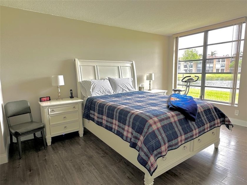 Discover this delightful first-floor unit in the sought-after - photo 23