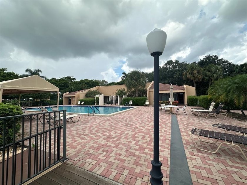 Discover this delightful first-floor unit in the sought-after - photo 31