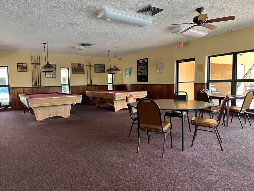 Discover this delightful first-floor unit in the sought-after - photo 32