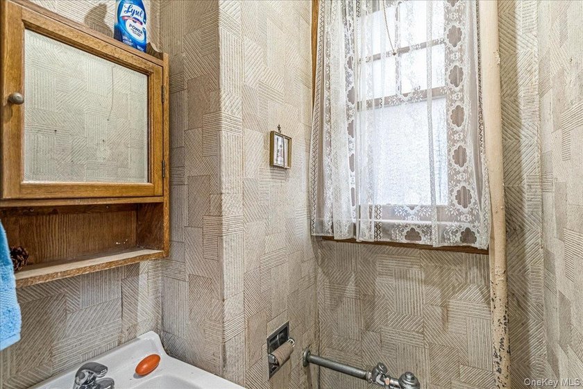 Welcome to 1404 E 49th Street, a semi-detached brick one-family - photo 13