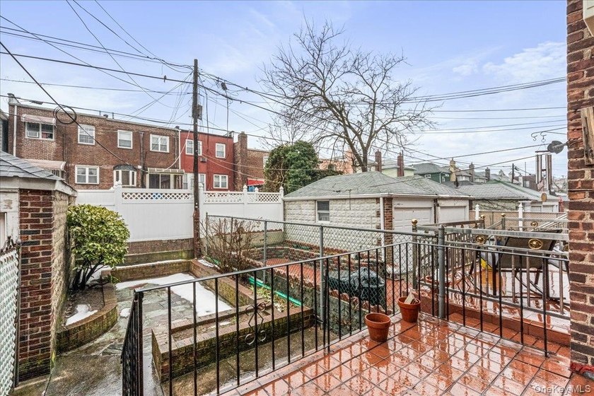Welcome to 1404 E 49th Street, a semi-detached brick one-family - photo 14