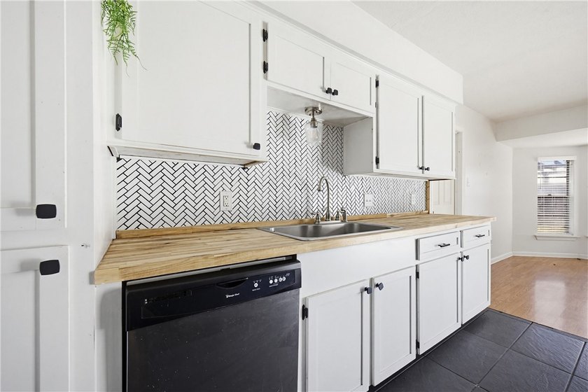 Welcome to this beautifully maintained 4-bedroom, 2-bath, 1-car - photo 8