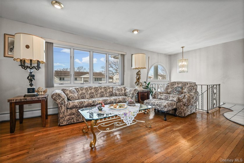 Waterfront high ranch offering 4 bedrooms and 2 full baths, set - photo 4
