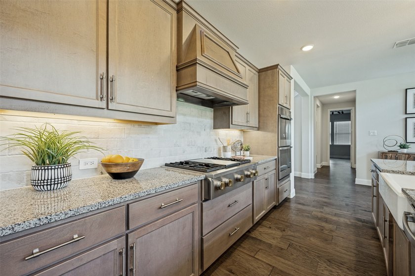 Discover this Taylor Morrison home featuring a thoughtfully - photo 3