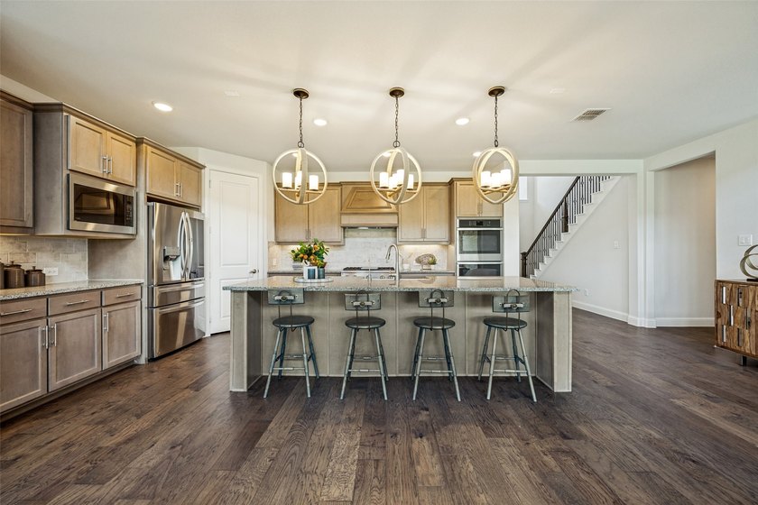 Discover this Taylor Morrison home featuring a thoughtfully - photo 4