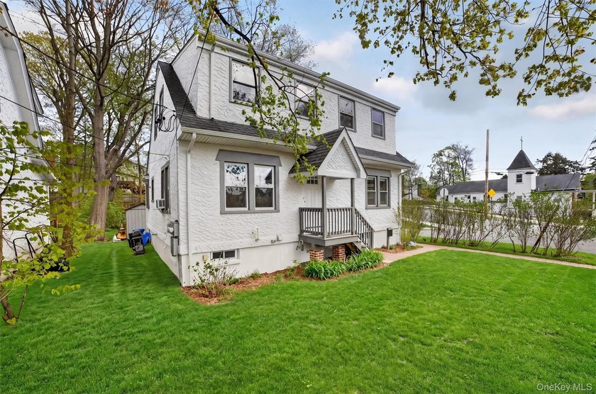Welcome to this beautifully maintained two-family duplex - photo 2