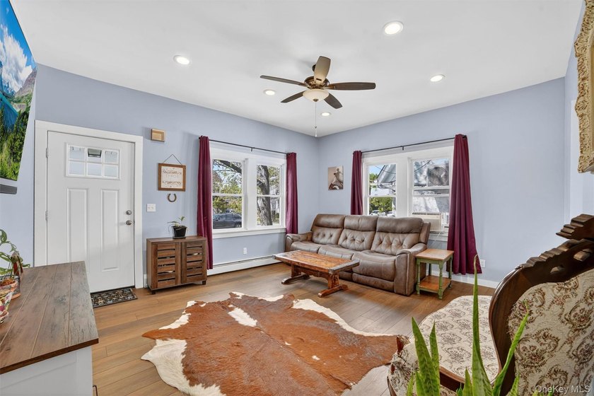 Welcome to this beautifully maintained two-family duplex - photo 4
