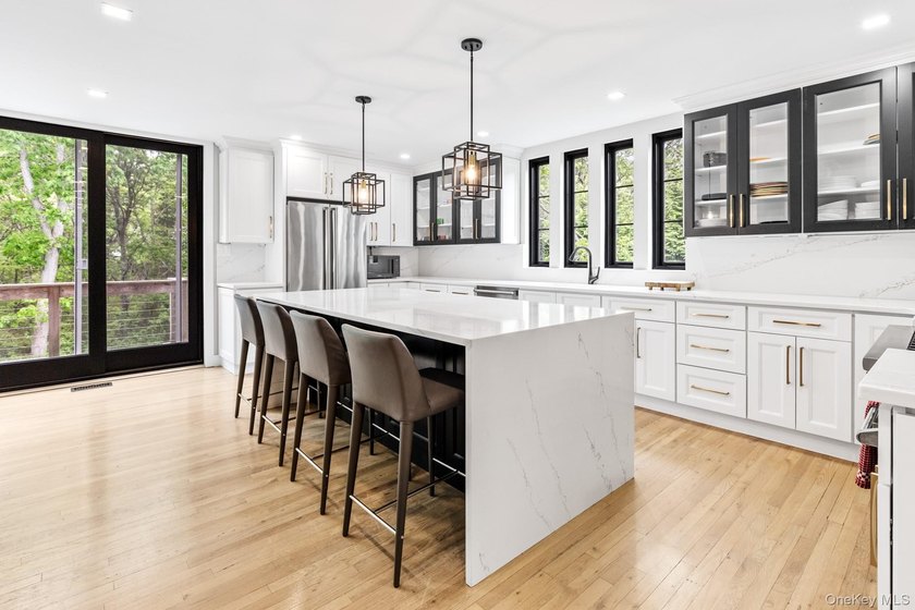 This exquisitely updated home is situated at the end of a - photo 7