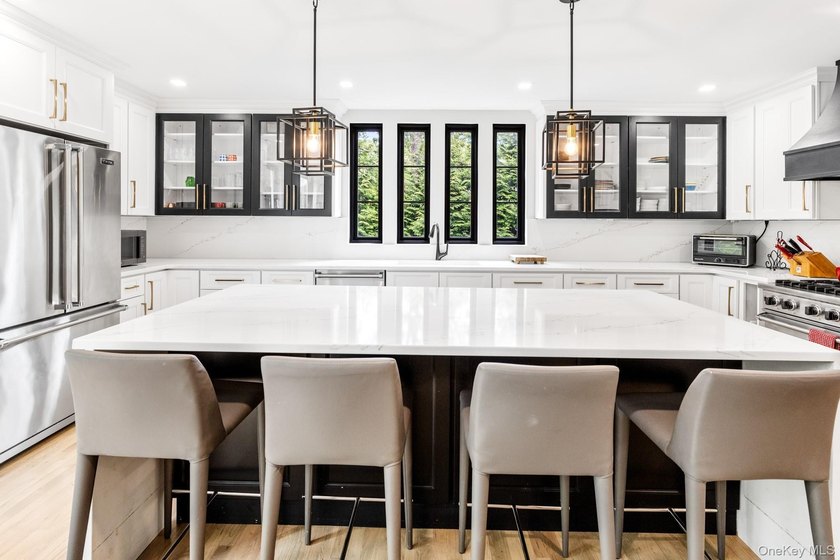 This exquisitely updated home is situated at the end of a - photo 8