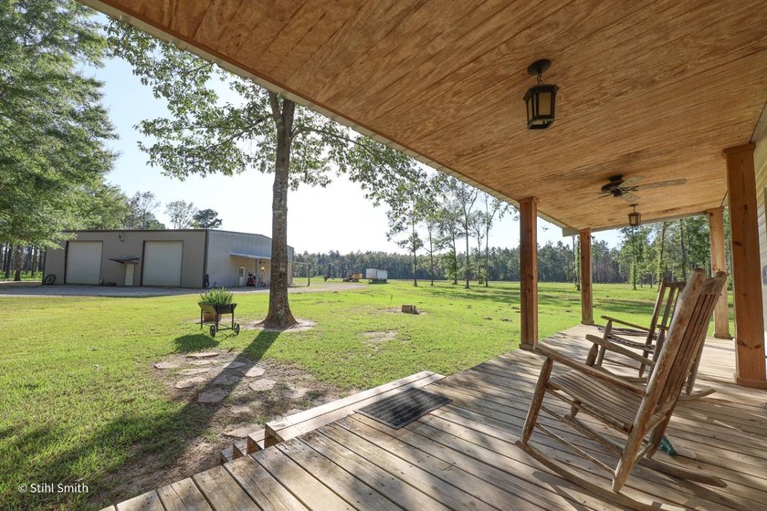 Home with a massive shop, two ponds, and plenty of privacy - photo 7