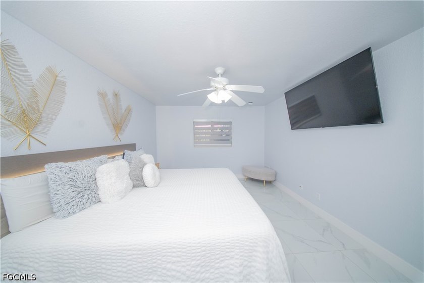 Located in Cape Coral, this impressive corner lot home, built in - photo 11