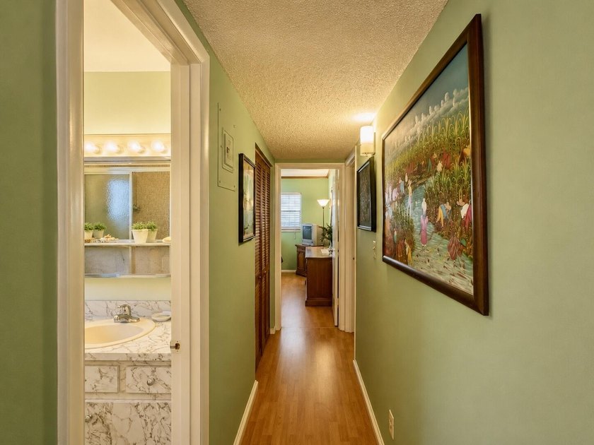 Charming corner-unit condo offering over 1,000 sq. ft. of living - photo 13