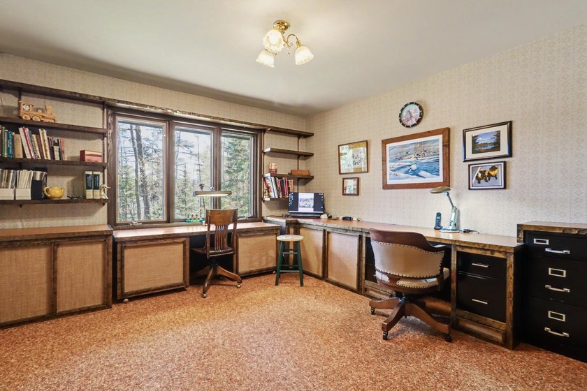 Nestled on nearly 4 private acres along the shores of 54 acre - photo 17